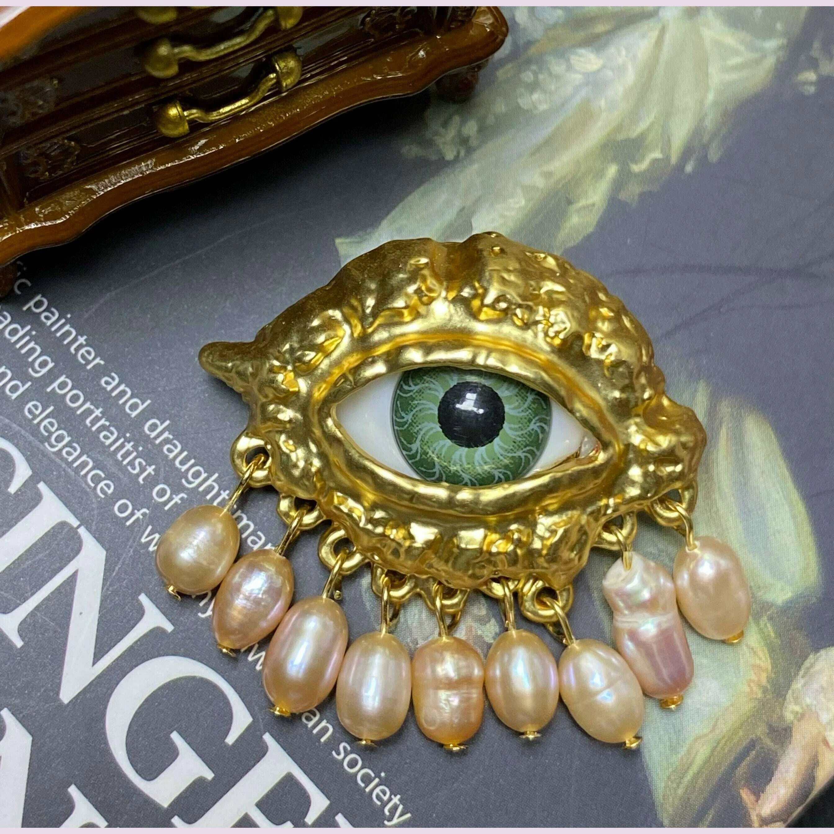 new-year-welfare-high-version-foreign-trade-devils-eye-mid-ancient-vintage-niche-eye-stud-ear-clip-brooch-535kimlud-womens-fashion-34607669