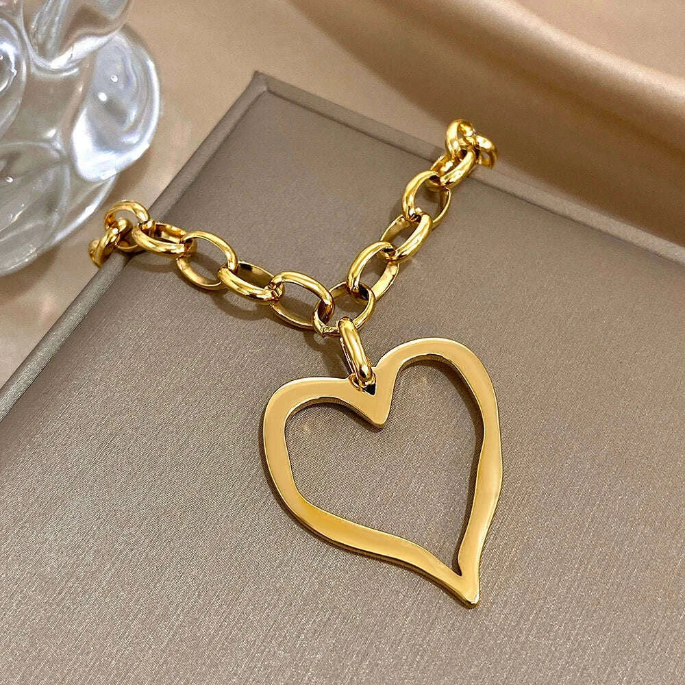 trend-stainless-steel-irregular-hollow-big-heart-pendant-necklace-for-women-golden-metal-thick-sweater-chain-necklace-jewelry-kimlud-kimlud-33913560