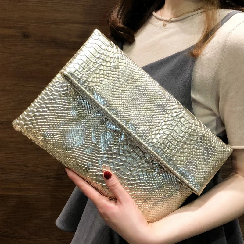 Snake Embossed Leather Clutch Bag — Black | KIMLUD
