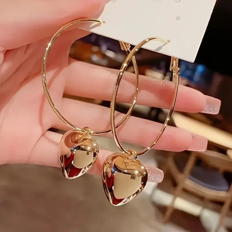 Alloy Heart Shaped Pendant Hoop Earrings — Silver | KIMLUD