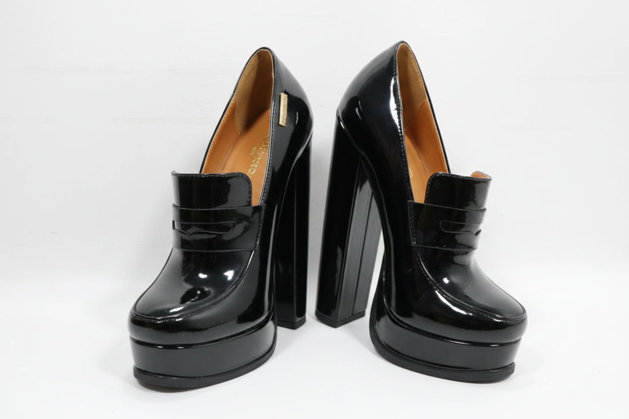 Black patent leather high-heeled pumps with platform soles and chunky block heels, shown on a plain white background with the brand name Sorbern in the top left corner.