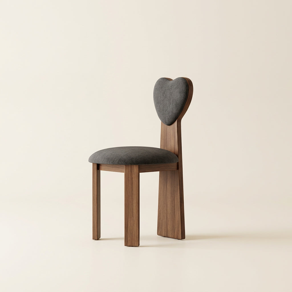 Chair with heart-shaped backrest on a neutral background, featuring MEA Chair brand.