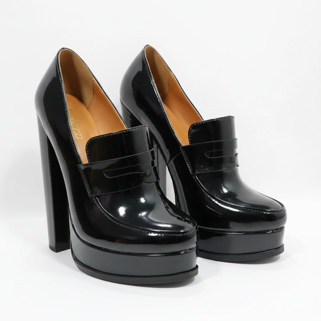 A pair of black patent leather high-heeled platform loafers with a chunky block heel, shown on a white background with the Sorbern brand logo in the top left corner.