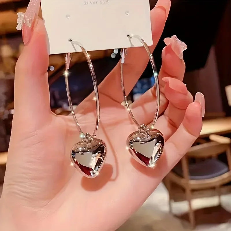 Alloy Heart Shaped Pendant Hoop Earrings — Silver | KIMLUD