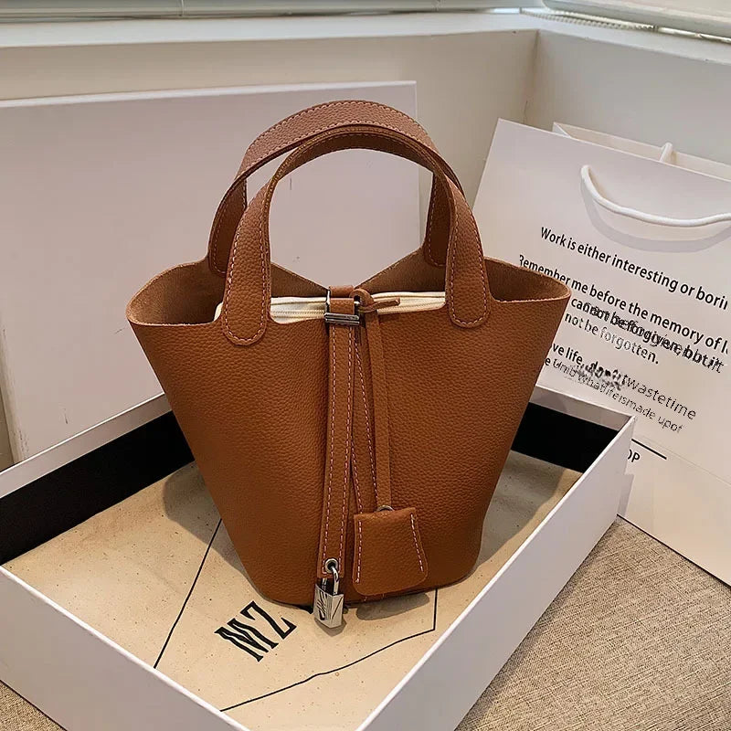 Fashionable 2023 New Women's Handbag Vintage Bucket Bag Niche Design High-end Feel Simple Tote Bag Waist Packs