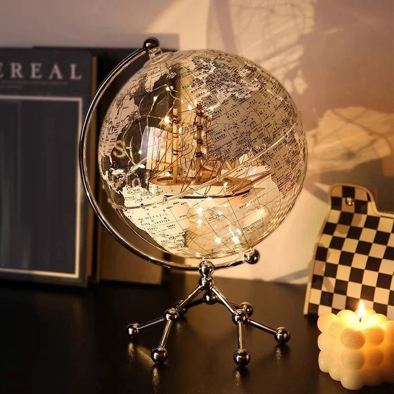 Polished Metal Globe Ornament Sculpture — Gold | KIMLUD
