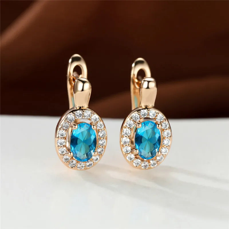 Rose Gold-Tone Stud Earrings Oval Zircon Halo — Sapphire Blue | KIMLUD
