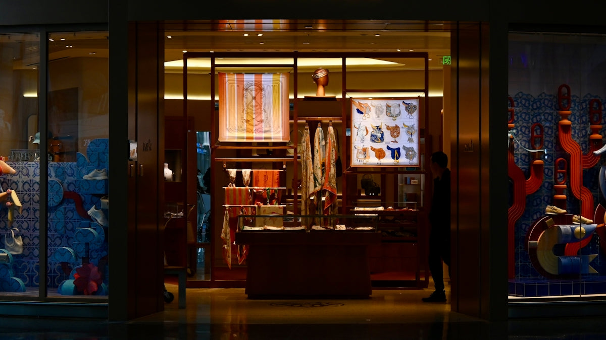 Luxury store window display at night