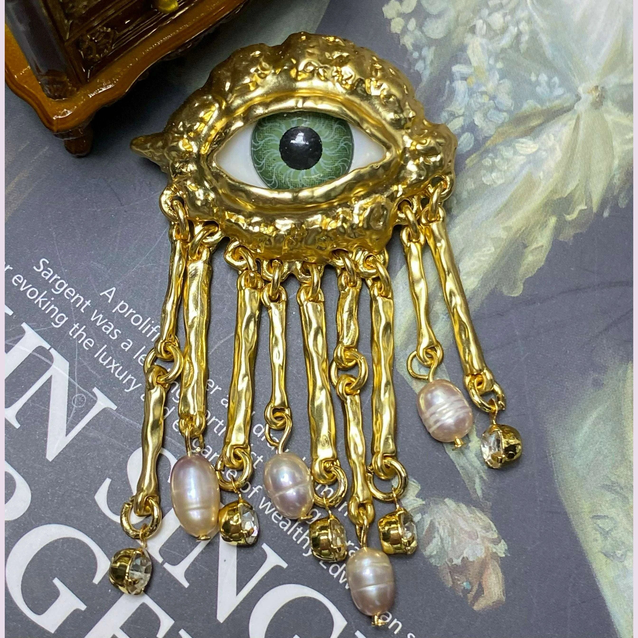 new-year-welfare-high-version-foreign-trade-devils-eye-mid-ancient-vintage-niche-eye-stud-ear-clip-brooch-535kimlud-womens-fashion-34607677
