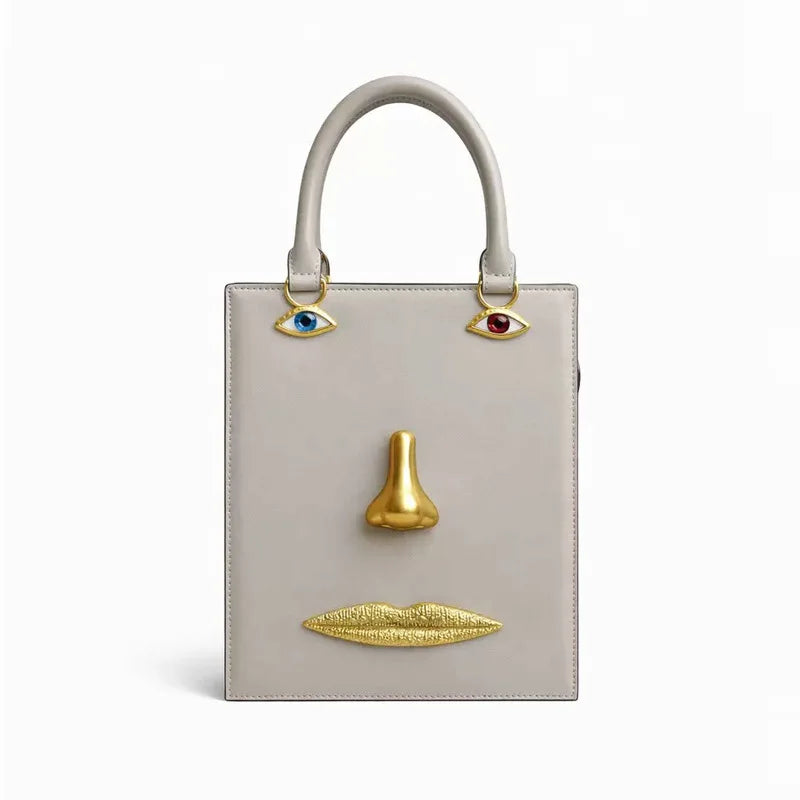 Gold-Tone Leather Face Bag Geometric Motif — Gold | KIMLUD