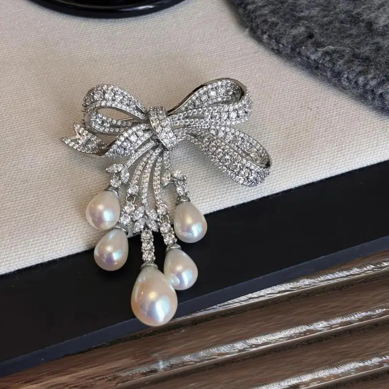 Bowknot Pave Crystal Tassel Brooch — Silver | KIMLUD