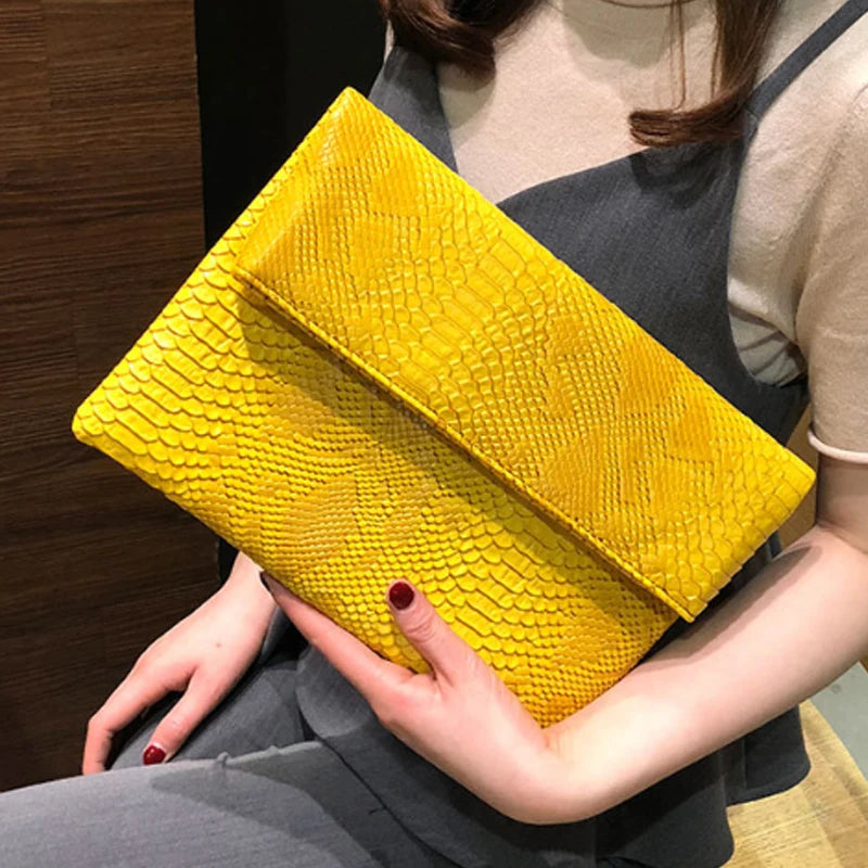 Snake Embossed Leather Clutch Bag — Black | KIMLUD