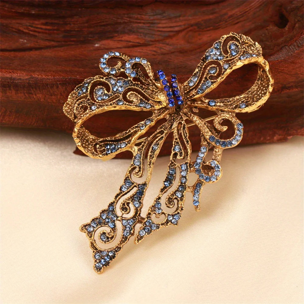 Baroque Bow Brooch Gold-Tone Finish — Blue Crystal Pavé | KIMLUD