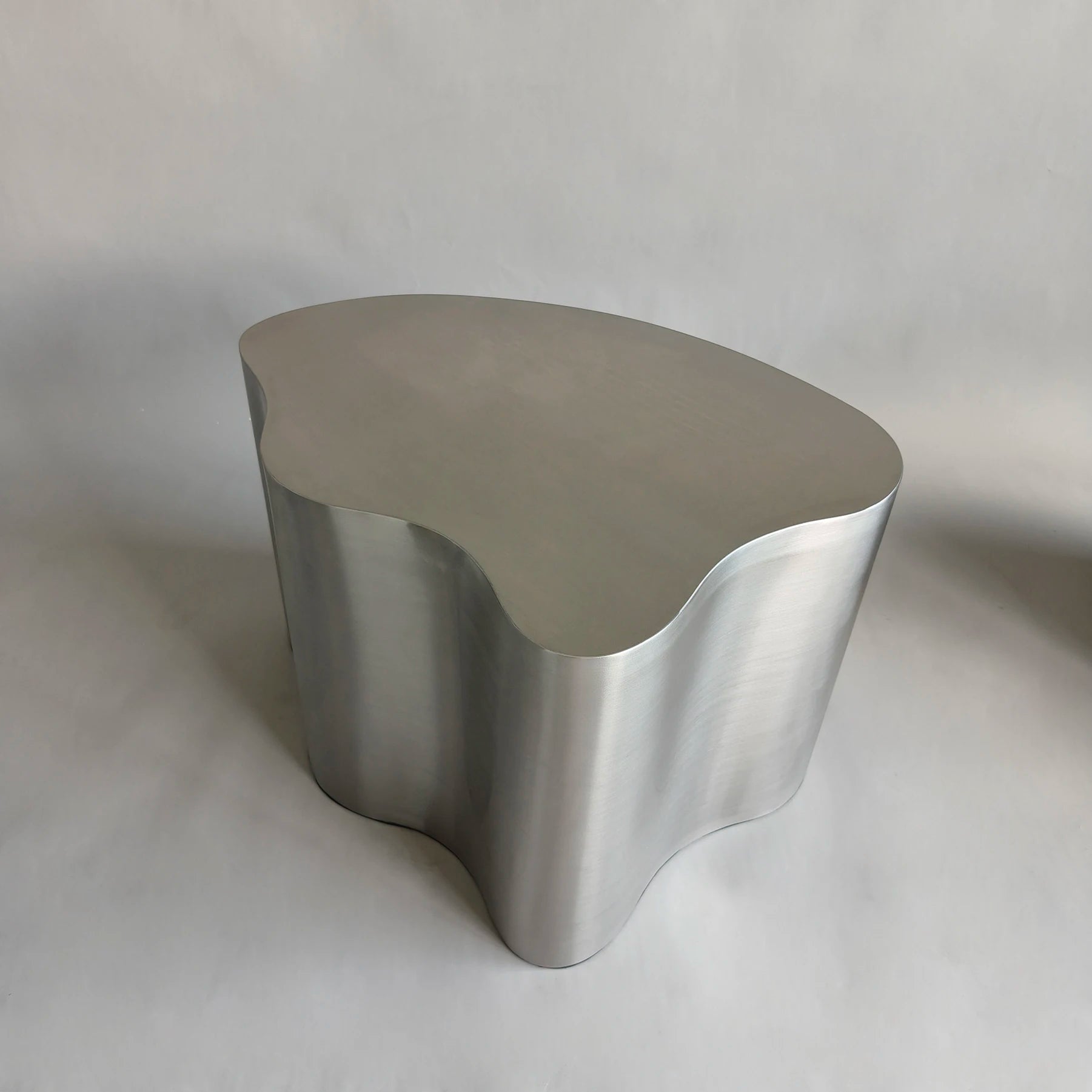 Industrial Metal Coffee Table Sculptural — Brushed Stainless Steel | KIMLUD