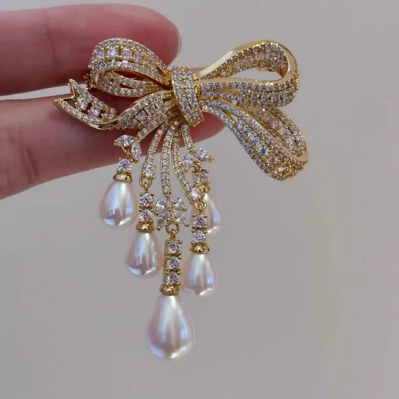 Bowknot Pave Crystal Tassel Brooch — Silver | KIMLUD