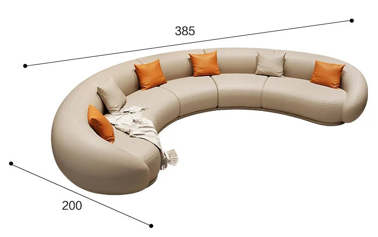 Round beige sofa with orange cushions on a black background with text and measurements.