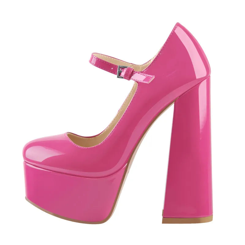 Pink platform high-heeled shoe on a white background