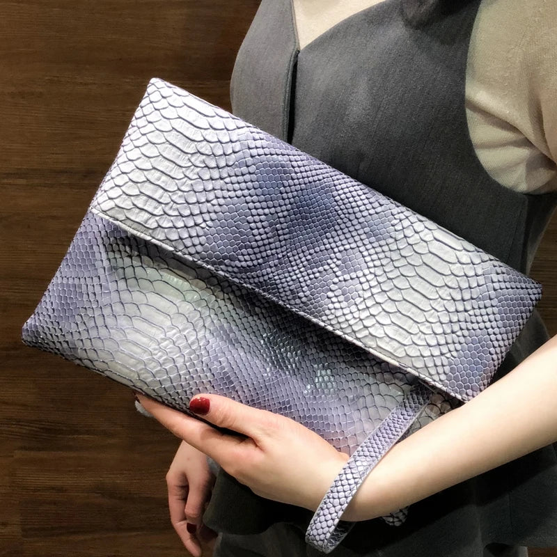 Snake Embossed Leather Clutch Bag — Black | KIMLUD