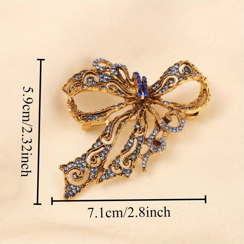 Baroque Bow Brooch Gold-Tone Finish — Blue Crystal Pavé | KIMLUD