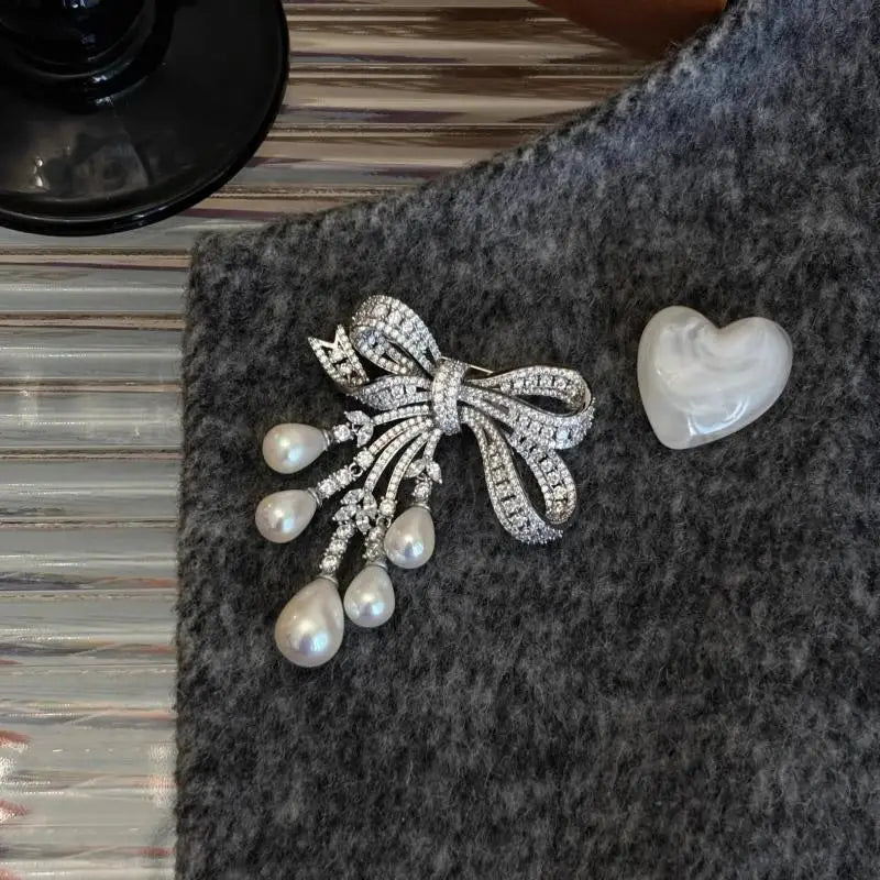 Bowknot Pave Crystal Tassel Brooch — Silver | KIMLUD