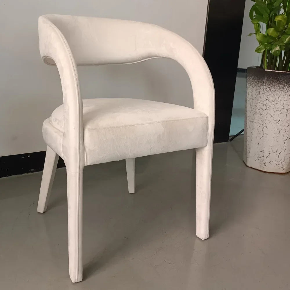 A Nordic minimalist modern designer shaped armchair living room dining room dining chair