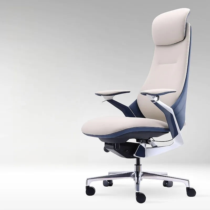 A modern high-back office chair with a cream and navy blue upholstered seat and headrest, featuring adjustable armrests and a chrome five-star wheeled base, shown against a light gray studio background.