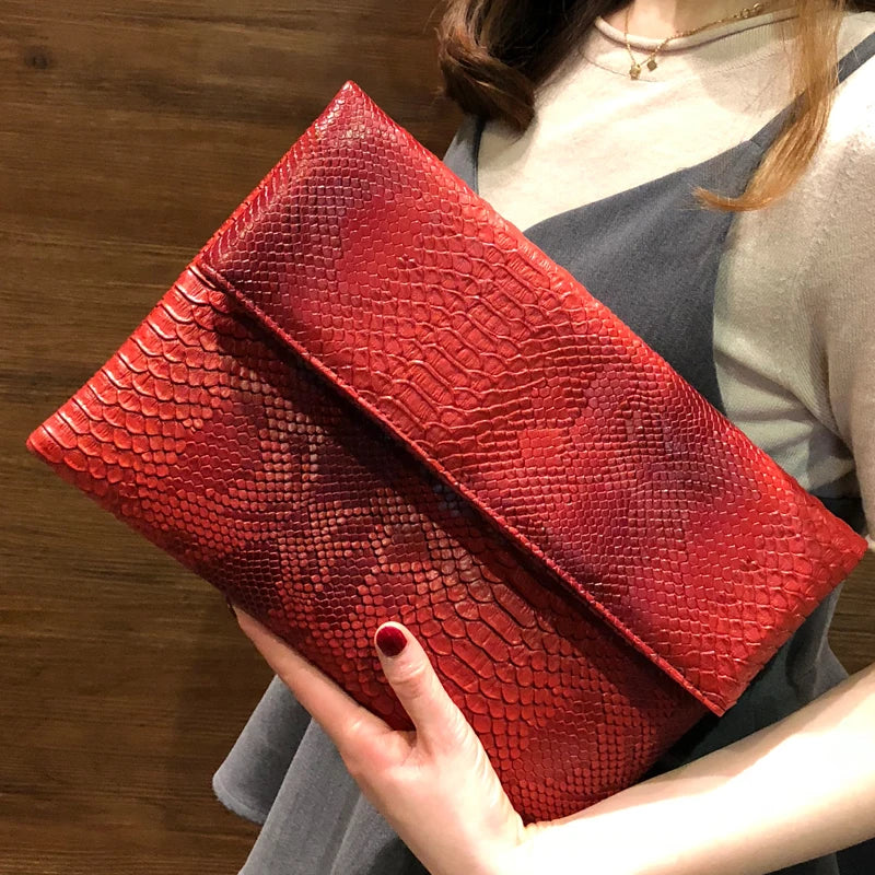 Snake Embossed Leather Clutch Bag — Black | KIMLUD
