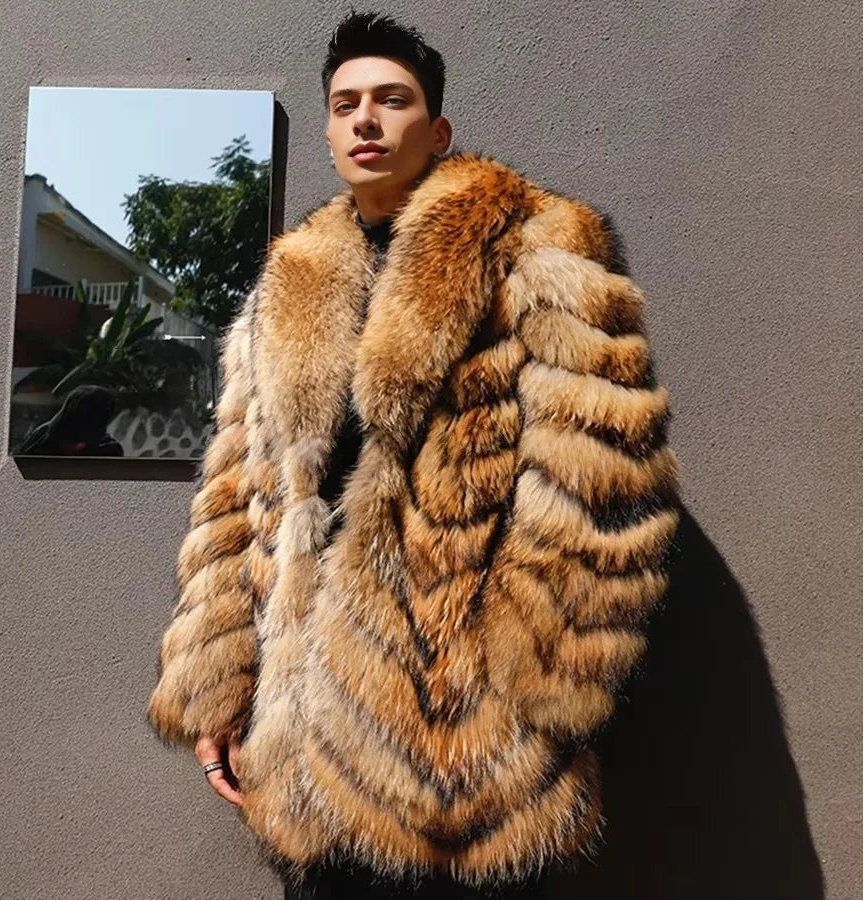 Man wearing a fur coat standing against a gray wall with a small mirror reflecting outdoor scenery.
