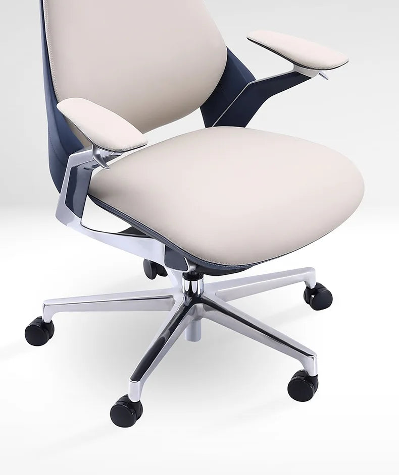 Close-up of a modern office chair showing the backrest, armrest, and seat in navy blue and light beige upholstery with a glossy silver metal frame.